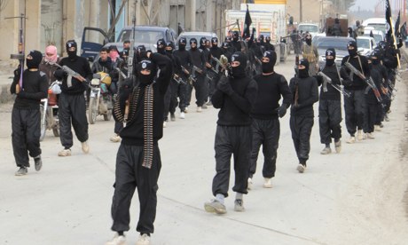 ISIS, over the past ten years, has collected arms and organized a surplus of troops. Photo from The Guardian.