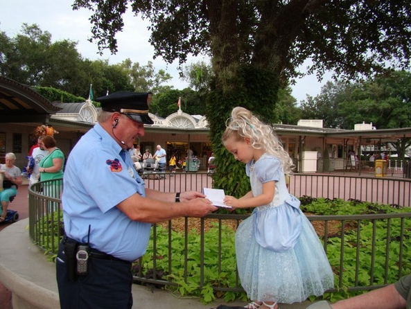 Photo courtesy of huffingtonpost.com  

The security guard at Magic Kingdom has an autograph full of childrens autographs to make them feel like princes and princesses. 