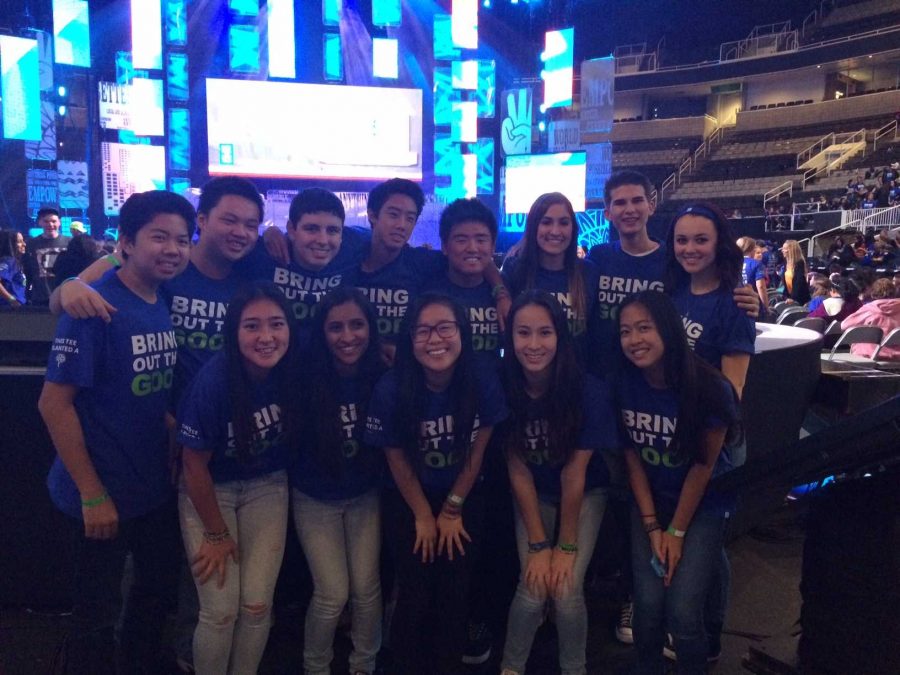 The 13 We Day attendees pictured in front of the We Day stage on February 25, 2015