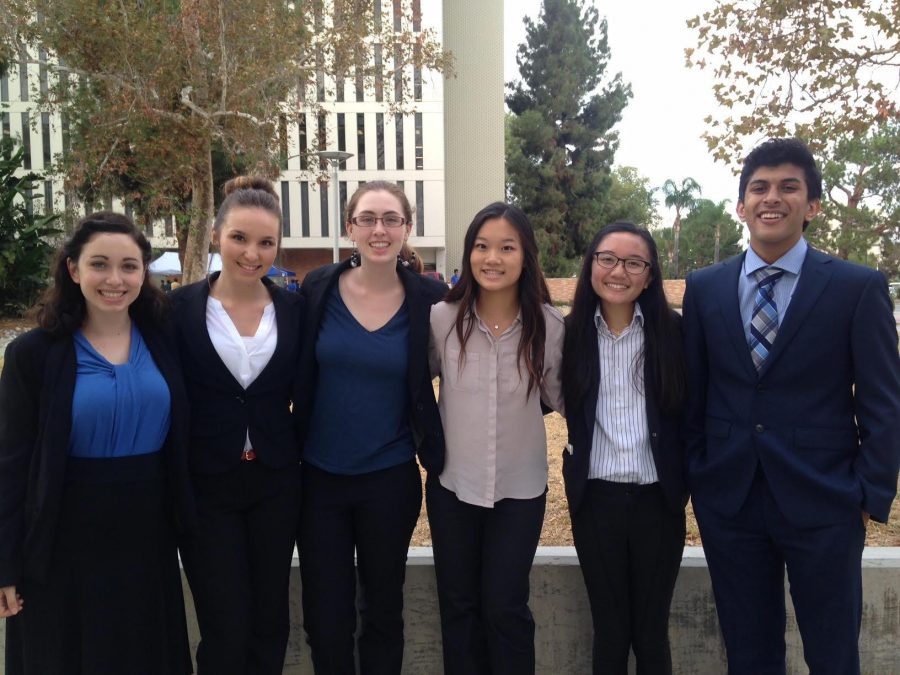 Some Speech & Debate students pose in their tournament attire during their first tournament of the year!