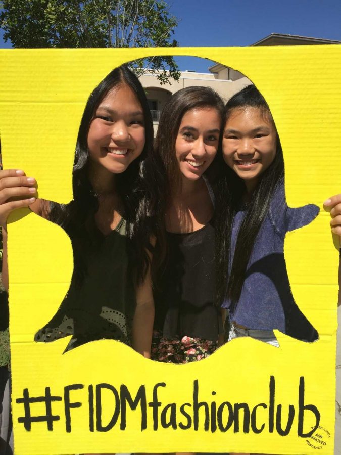 Fashion Club members, Sara Lui (12), Nicole Espinosa (12), and Morgan Lui (10), publicize their club on snapchat.