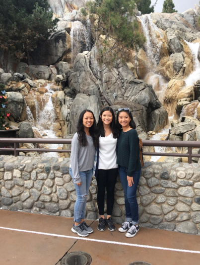 Katrina with her friends, Maddy Ho and Karissa Dole, at Disneyland for orchestra.