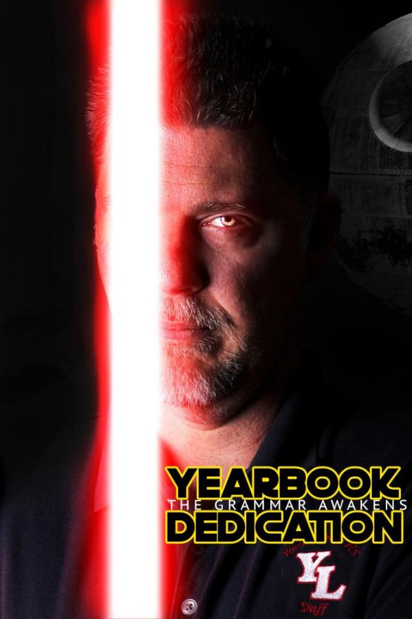 Above, Mr. Cadra poses in a Star Wars themed picture. Combining the two things that he loves, Star Wars and Grammar