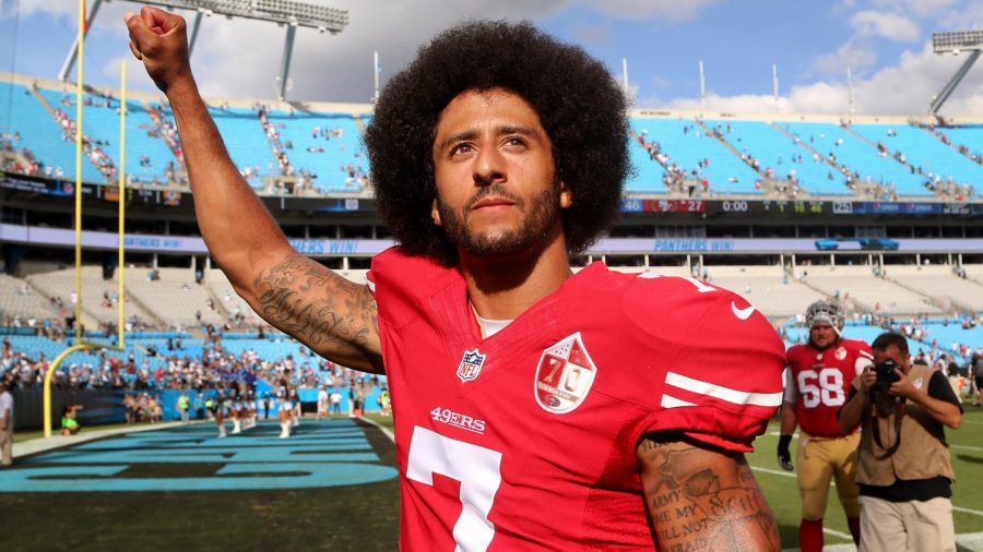 Kaepernick+raises+his+fist+after+a+game+against+the+Panthers.%0A