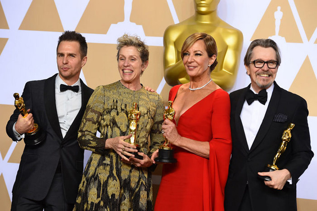 The four best actor winners posed for the camera with big smiles. 