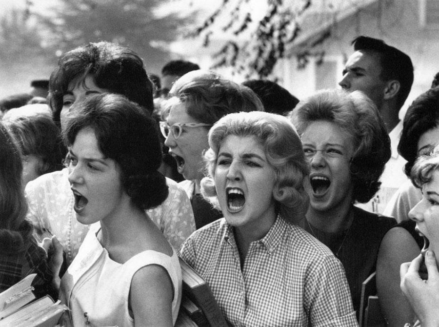 White high school students cursing black students on the first day that public schools were integrated in Montgomery, 1963