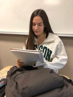 Jessica Ryan (12) studies before her math test by reviewing her notes and using practice problems.