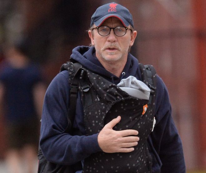 Daniel Craig carrying his baby in a papoose