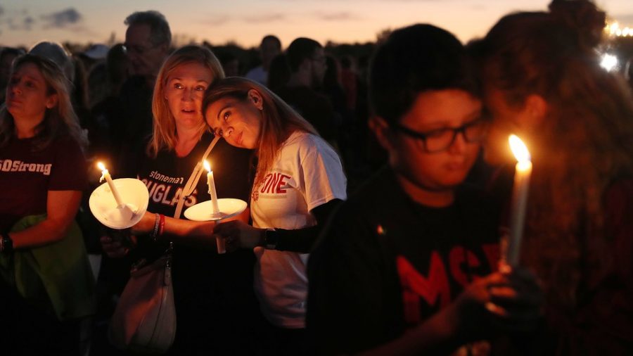 Parkland+residents+attended+a+1+year+anniversary+vigil+to+commemorate+those+lost+in+the+2018+shooting+and+mourn+the+deaths+of+the+two+young+teens+lost+during+a+year+later.+