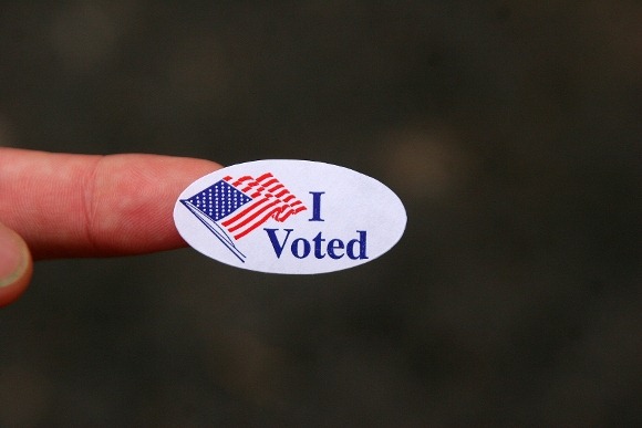 The image captures an “I Voted” sticker given to Americans who vote.