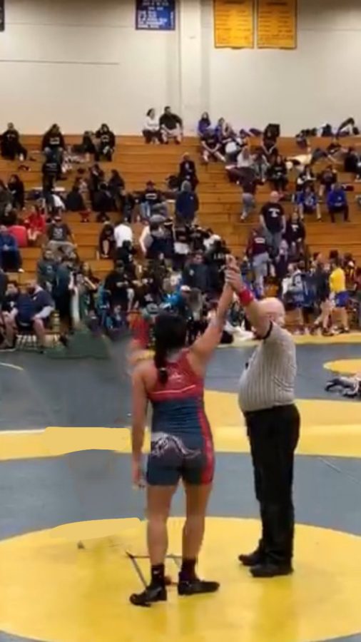 The end of a wrestling match won by Karina Shah.