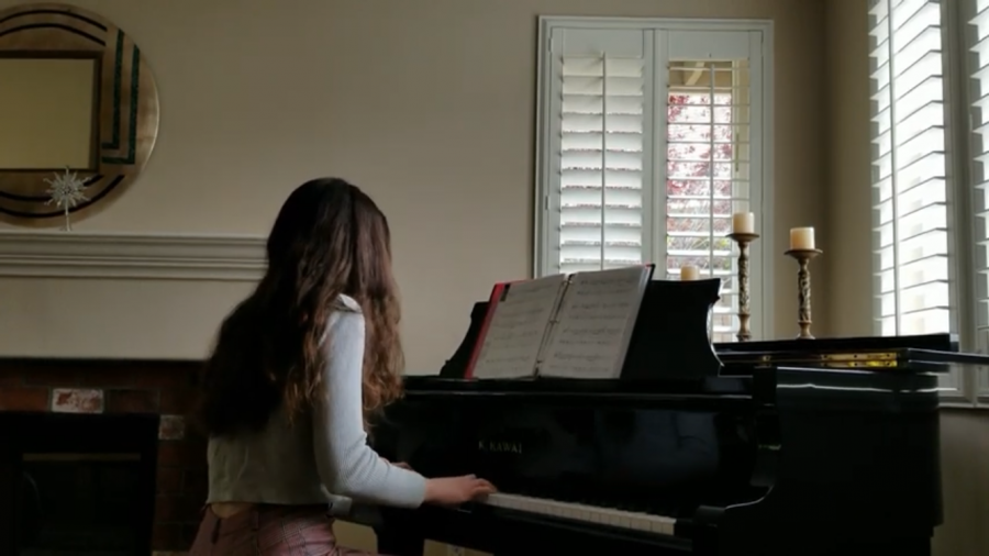 Juliana Person (9) plays a piano piece for her church’s live stream April 19, 2020
