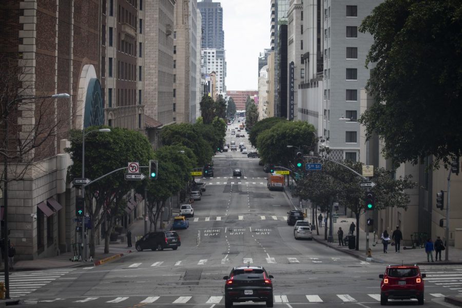 Downtown Los Angeles’ usually bustling Grand Avenue sees light traffic during the lockdown.