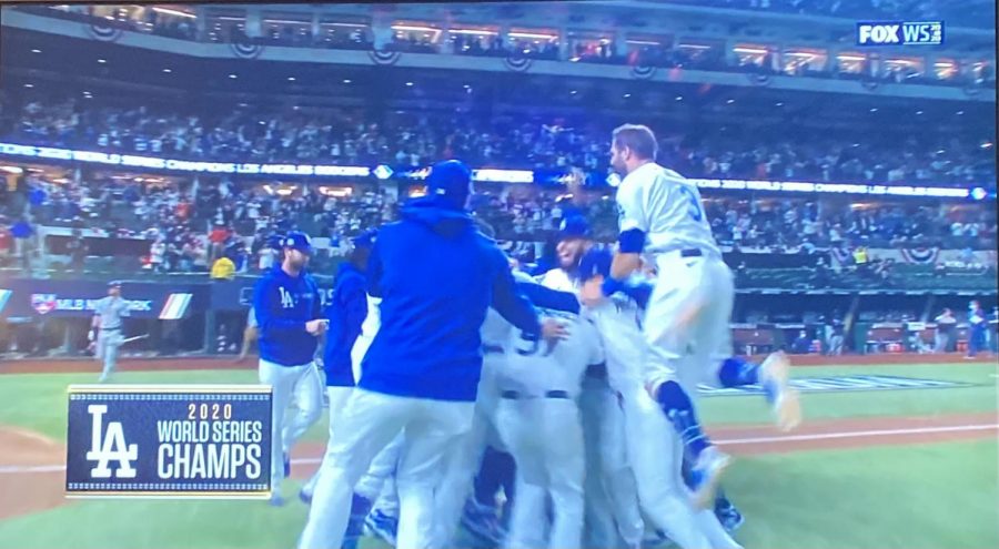 The Los Angeles Dodgers celebrate on the field as they win the Major League Baseball World Series. 
