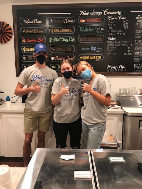 Yorba Linda High School seniors, Emily Kraack (12) and Ashley Ruggles (12), are shown working at Blue Scoop Creamery in Yorba Linda following new regulations due to COVID-19.