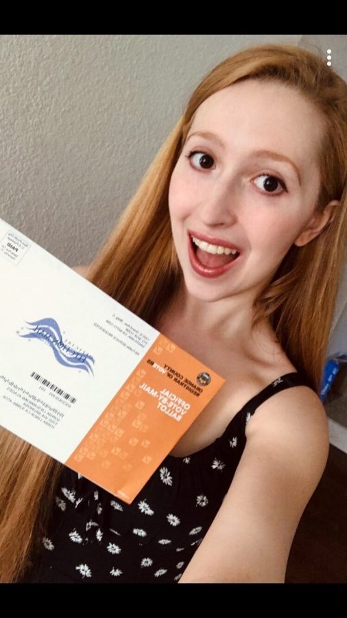 Liesl Klages (12) pictured here with her mail in ballot for the 2020 election.