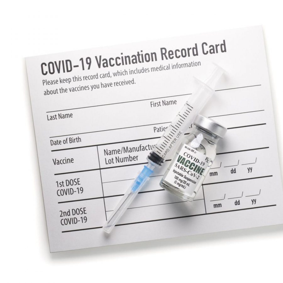 COVID-19 vaccination record cards display the recipient’s full name and date of birth, which allows people to steal this information when pictures of the card are posted online.