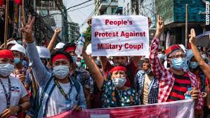 People in Myanmar participate in a deadly protest against a military coup.