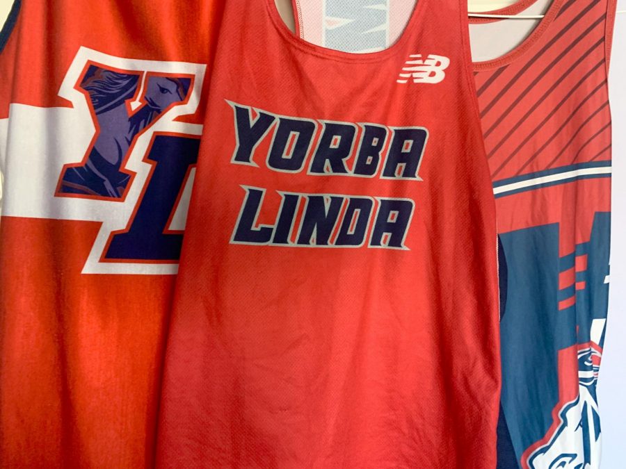A few Yorba Linda High School uniforms from the YL Wrestling team and Track team.