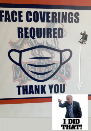A sticker of Joe Biden with the caption “I DID THAT!” pointing at a sign that demonstrates the mask requirement indoors at YLHS. 