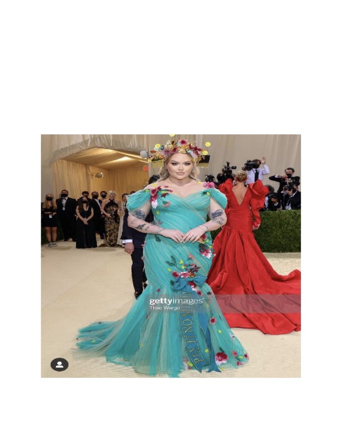 This is Nikkiturials at the Met Gala in her flower galour dress.