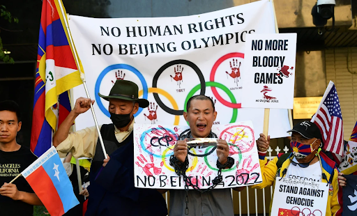 Human-rights protesters gather at the Los Angeles Chinese Consulate to demand the boycott of the 2022 Winter Olympics in Beijing.