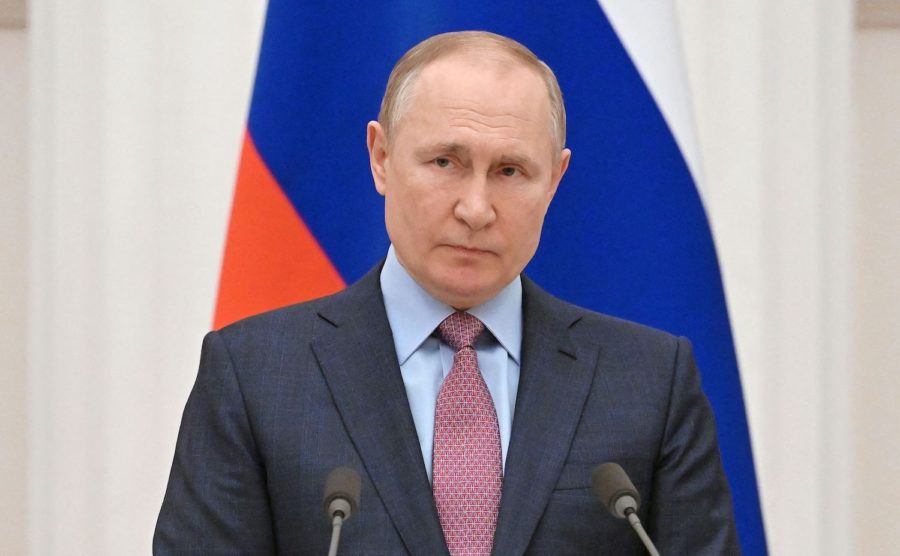 Russias President Vladimir Putin attends a press conference with his Belarus counterpart, following their talks at the Kremlin in Moscow on February 18, 2022. 