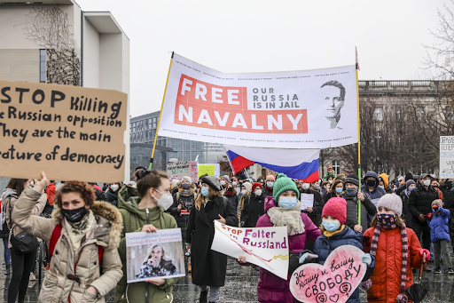Russian protesters rally to support Kremlin critic Alexei Navalny after his poisoning and arrest.