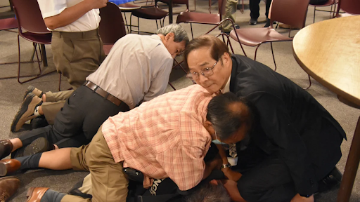 Multiple Presbyterian church members collectively incapacitating the gunman on May 15, 2022.