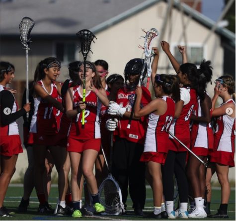 A group photo of the Yorba Linda JV Girls Lacrosse team at the Edison game. 
