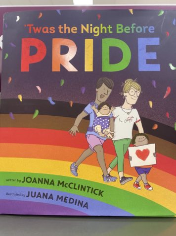A children’s book depicting proud LGBTQ+ parents and their children demonstrates the preparations on the night before a pride parade.