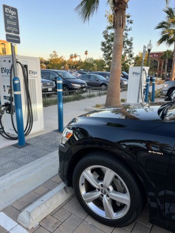 An Audi e-tron parks in front of a local charging station in Yorba Linda, California.
