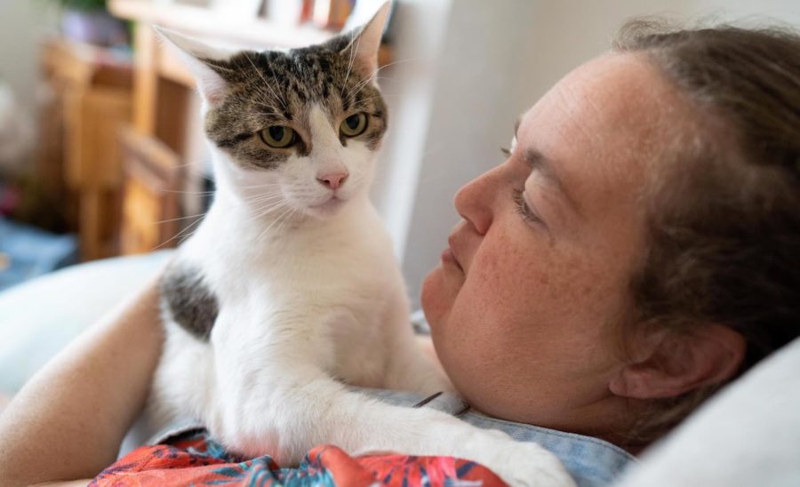 Sam Felstead and her cat, Billy, who unknowingly saved her life just a few days before the photos were taken.