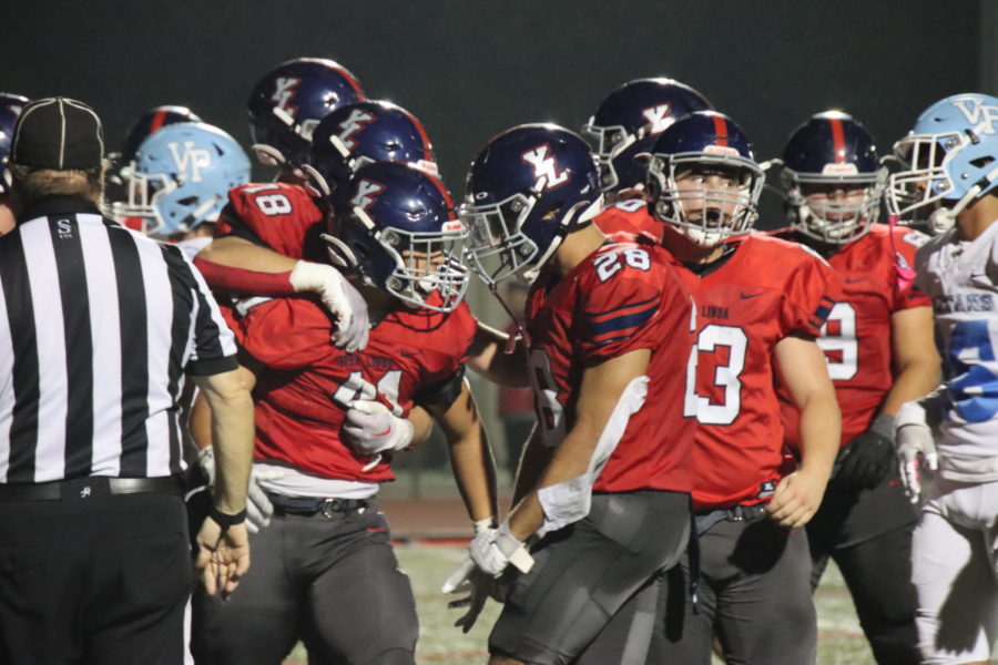 After one of the games last touchdowns, some Yorba Linda football boys celebrated another victory. 