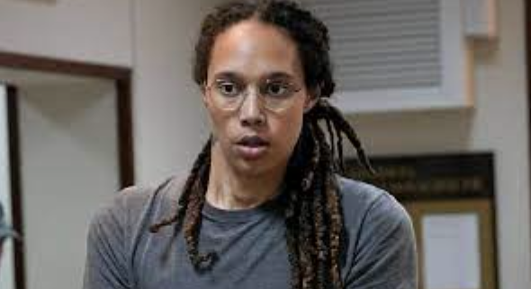 Griner pictured after being escorted out of a courtroom in a city near Mosco in early August. 
