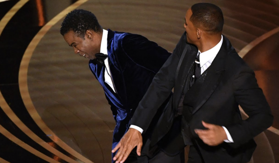 Caption%3A+Will+Smith+slapping+Chris+Rock%2C+who+was+the+host+at+the+2022+Oscars.%0A