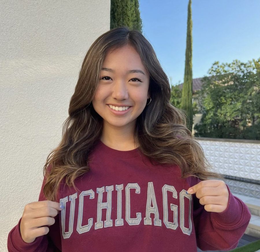 After dedicating several years to playing lacrosse, Sora Choi (11) proudly poses for her commitment post to UChicago.