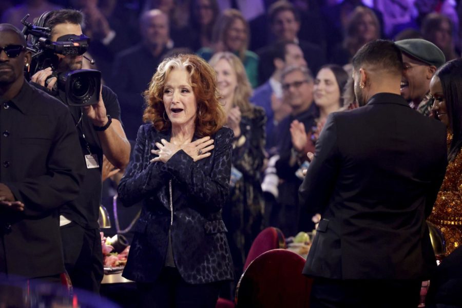 Bonnie Raitt stands shocked after receiving Song of the Year.
