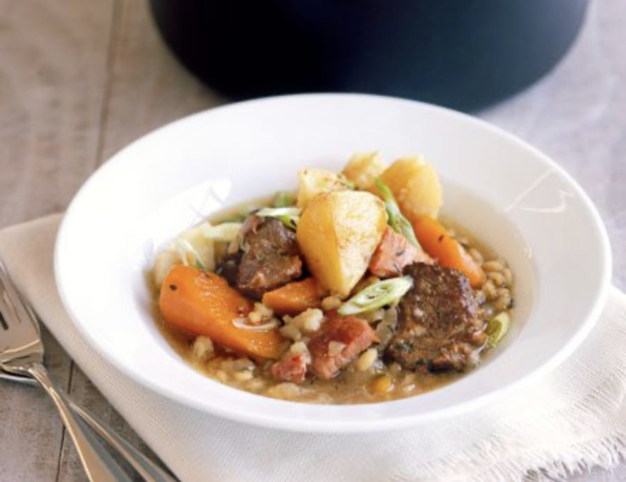 A delicious Irish stew is shown above with potatoes, carrots and other vegetables and meats