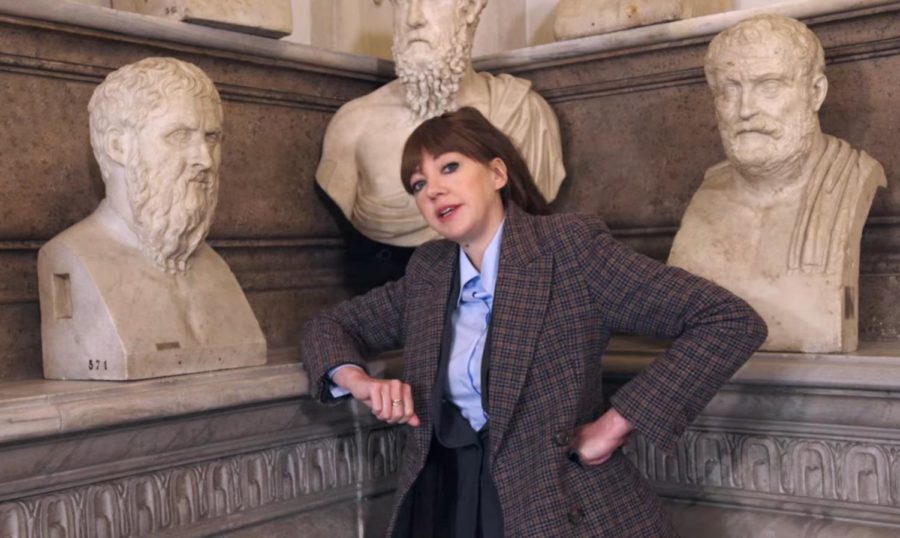 Philomena Cunk takes us back to Ancient Greece as she poses stylishly in front of these sculptures