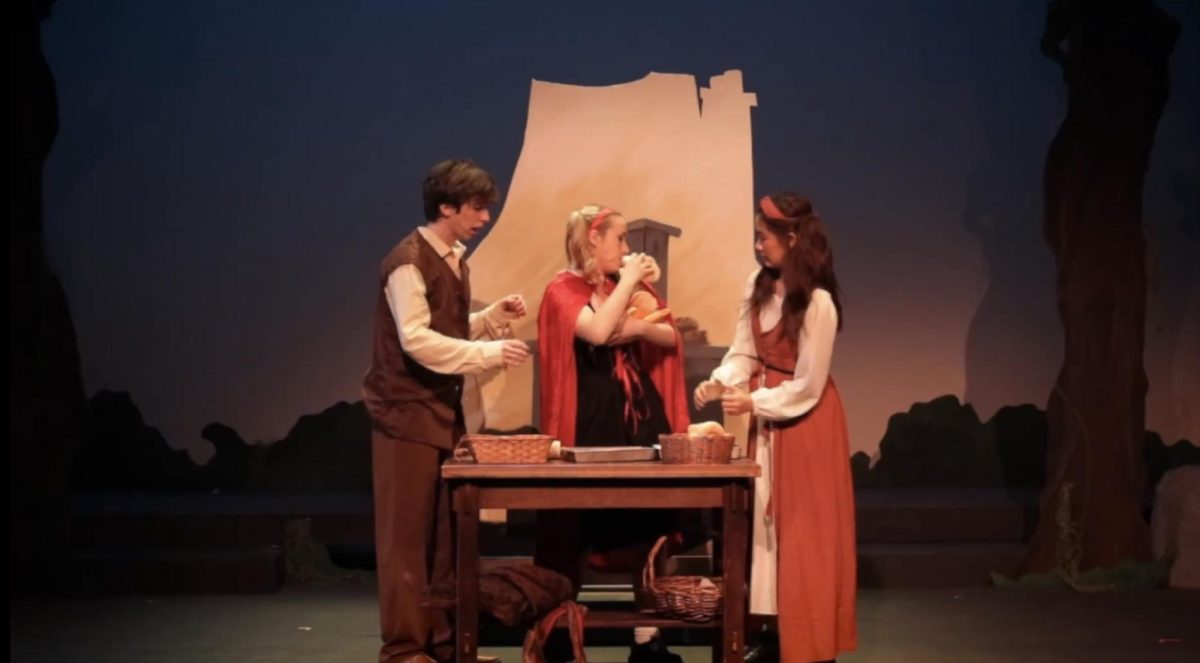 Katie Ruoo (right) Quinn Oeppinger (left) Addy Shoup (center) performing in the fist act. 