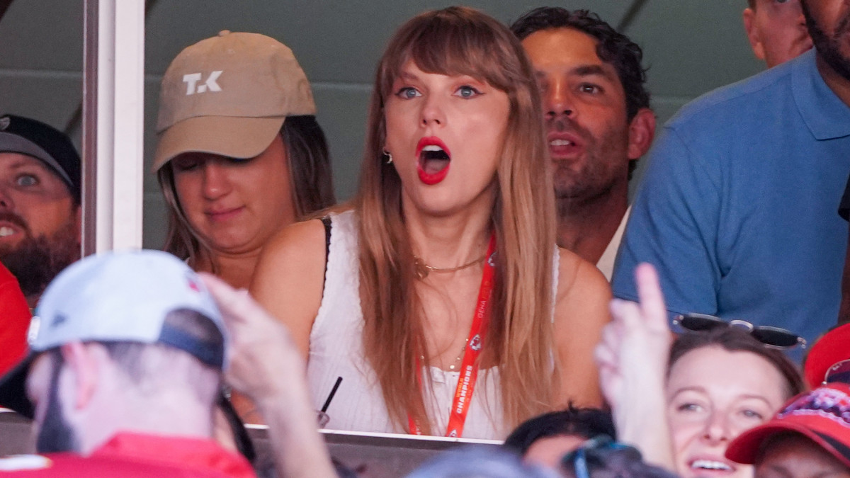 Taylor Swift at the Kansas City Chiefs’ game on September 24, 2023 sitting in a booth with Kelce’s family.  
