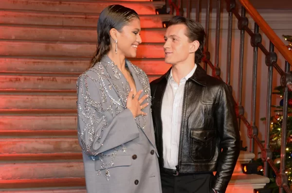 Tom Holland and Zendaya looking lovingly at each other at the Spider-Man: No Way Home premiere in December 2021. 
