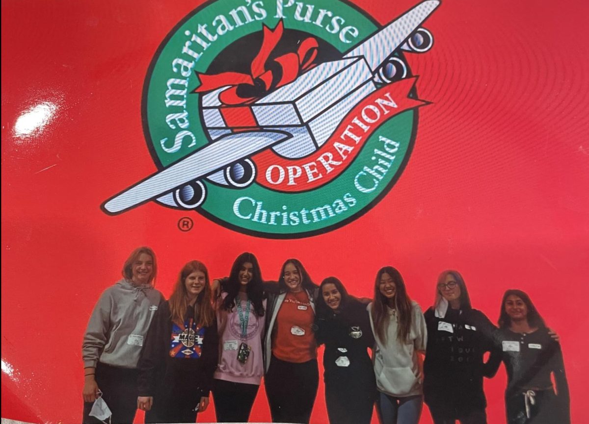 My+girl+scout+troop+and+I+after+volunteering+at+Operation+Christmas+Child+in+2019.+