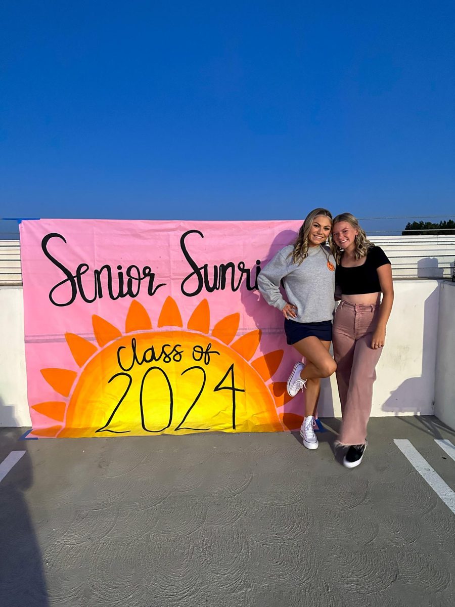 Ryann Herman and Emma Perron (me) watching the sunrise on the last first day of high school. 