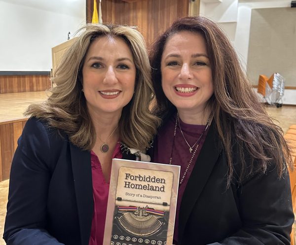 My aunt (left), the author of Forbidden Homeland, and my mom (right) holding up the book at Glendale Library.