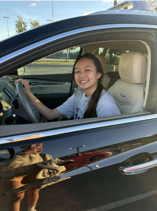 Chloe Chang (11) just got her license and after her first day driving to school, proud friend Giana Mejia (11) took a photo of Chloe in her new car. 