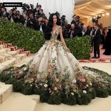 A version of Katy Perry stands on the steps of the MET in a breathtaking gown.