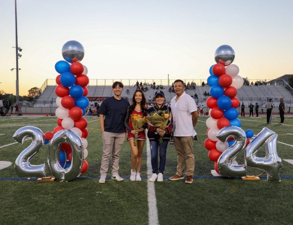 Kaitlyn Wu celebrating song senior night with her family. 