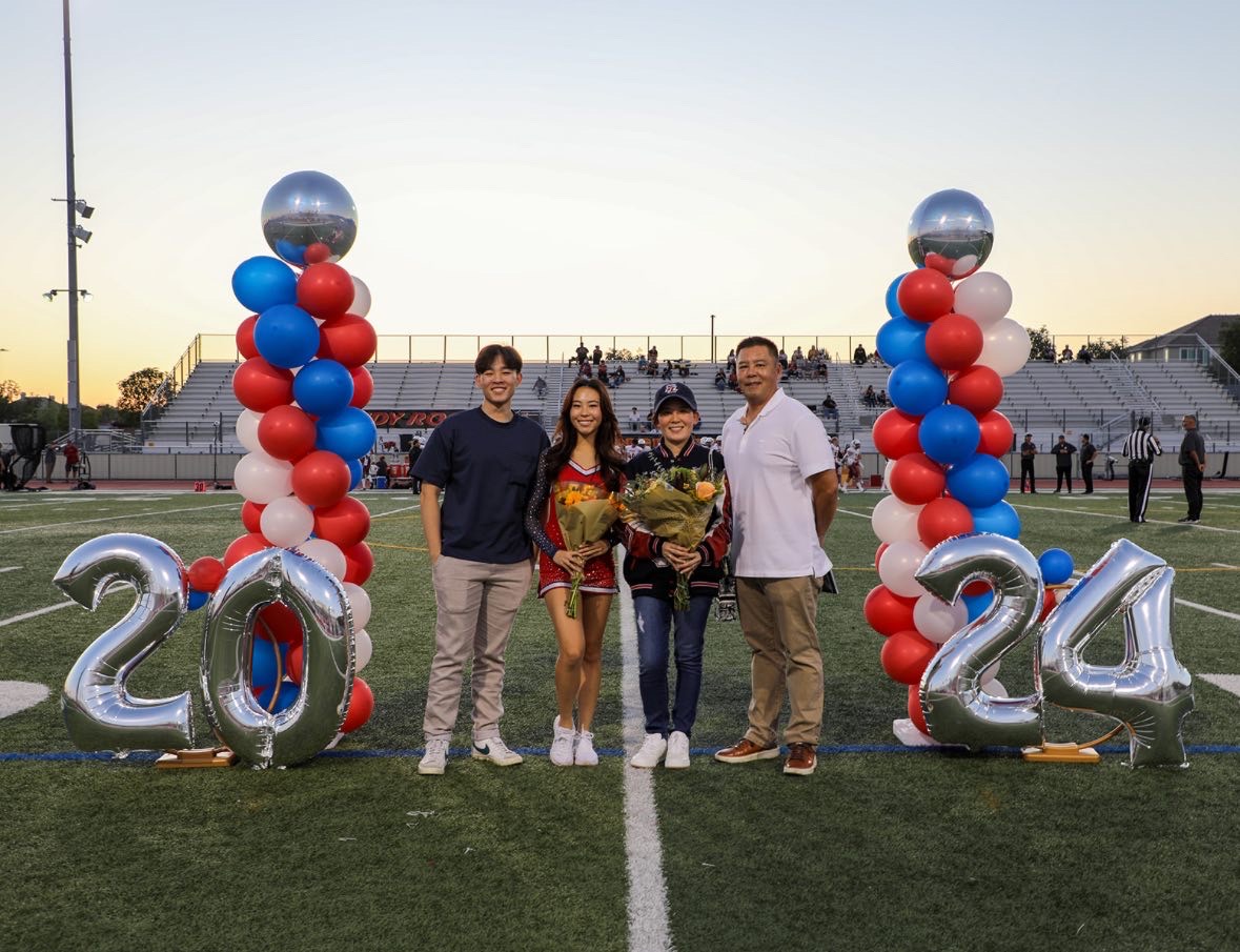 Kaitlyn Wu celebrating song senior night with her family. 